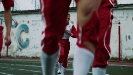 students in red and white uniforms
