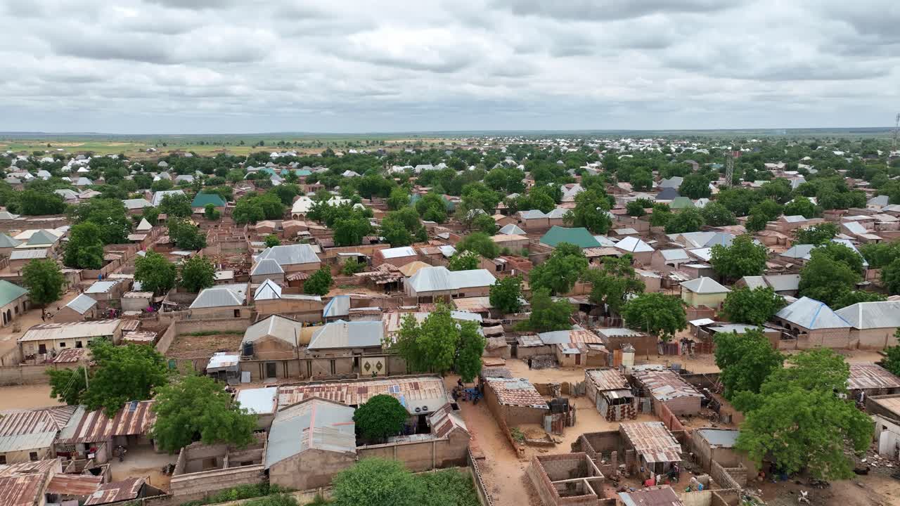 Slow forward aerial flyover restive town of Funtua in Northern Nigeria