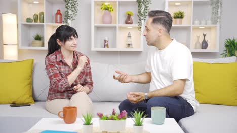 married couple playing fun games at home.