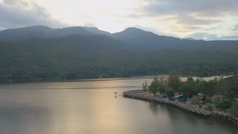 Aerial-of-resort-on-lake-in-Thailand-at-sunset