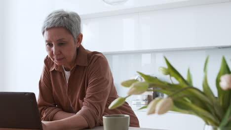 woman reading recipe