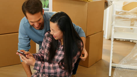 Couple-showing-house-key-while-taking-selfie-with-mobile-phone-4k