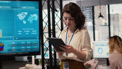 vertical video empowered ceo examining monthly reports data for efficiency