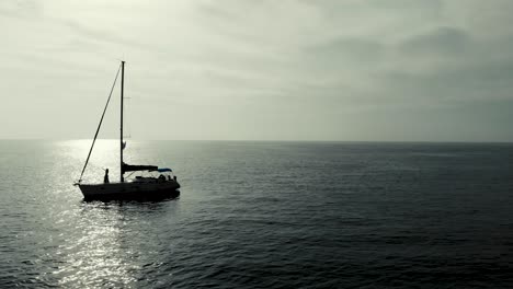 Girl-dancing-alone-on-a-yacht-Drone-shot-4k