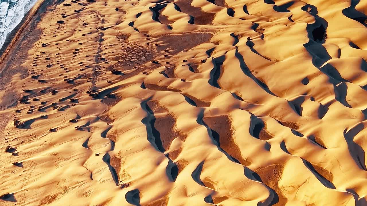 Aerial view of the dunes in Gran Canaria, Spain near the ocean