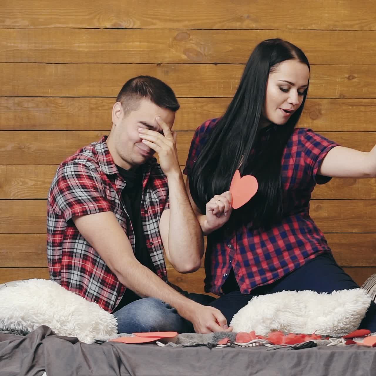 Happy couple posing in studio