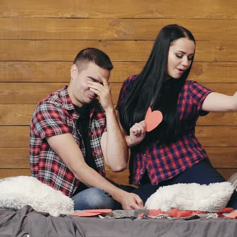 happy couple posing in studio