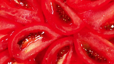 harvest ripe red slices tomato. tomato rotation. top view