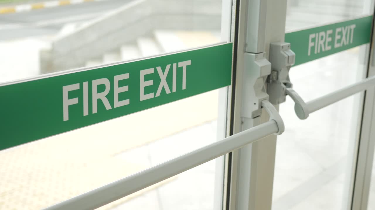 Fire Exit Sign on Glass Door