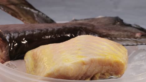 raw fish fillet and parts