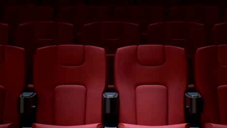 seamless red chairs in cinema hall. looped 3d animation of rows of red seats in cinema with dof blur. art and media concept.