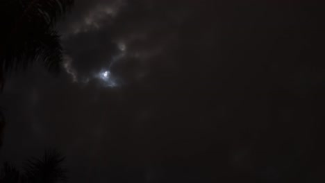 timelapse of moon moving through dynamic cloud cover