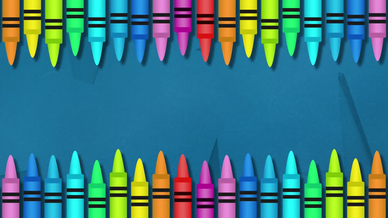 varios lápices de colores contra un fondo azul