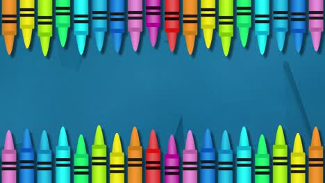 varios lápices de colores contra un fondo azul