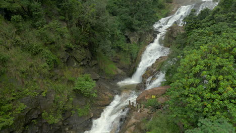 closeup establishing aerial drone shot of ravana falls in ella sri lanka