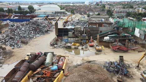 Car-breaker-yard-recycling-plant-Erith-Kent-UK-drone-pan-footage-4K