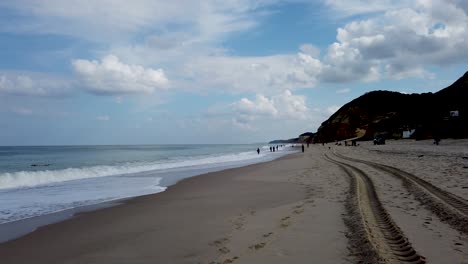 Lot-of-Men-Fishing-on-the-long-Beach