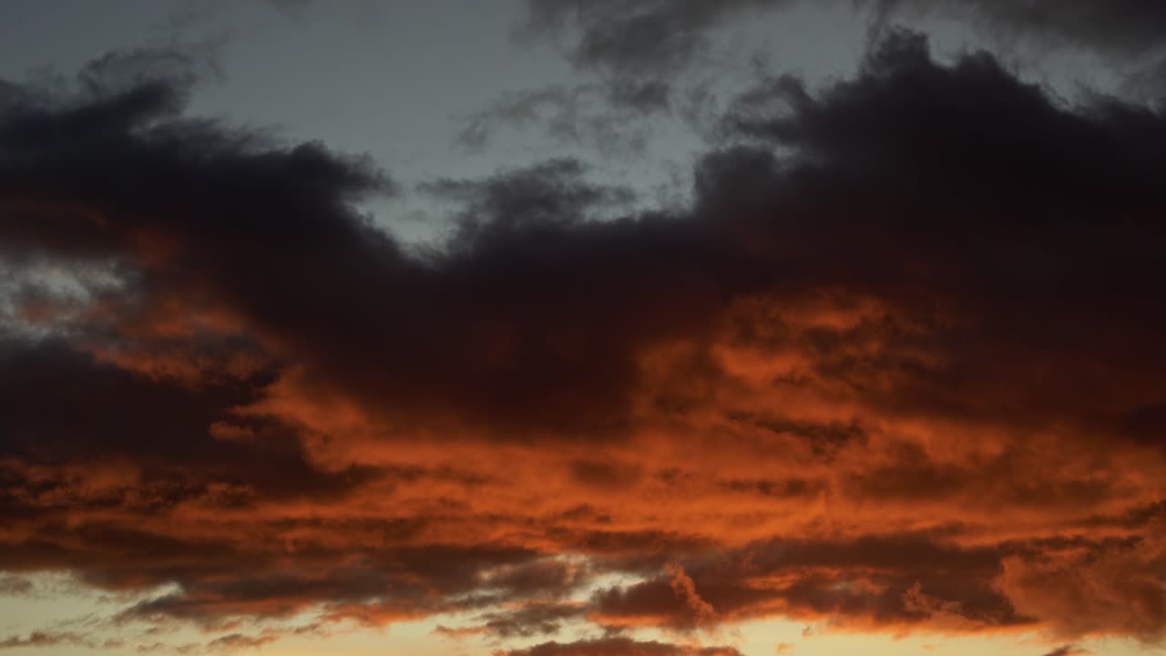 Tilting down shot revealing a beautiful vivid golden sunset from the top of the famous Morro Pai Inacio in the Chapada Diamantina National Park in Bahia Northeastern Brazil on a warm summer evening