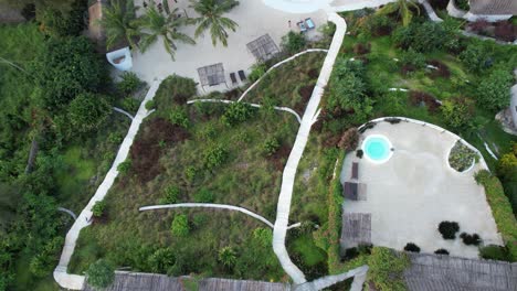 Aerial-view-of-a-resort-in-Zanzibar-ending-in-the-Indic-Ocean