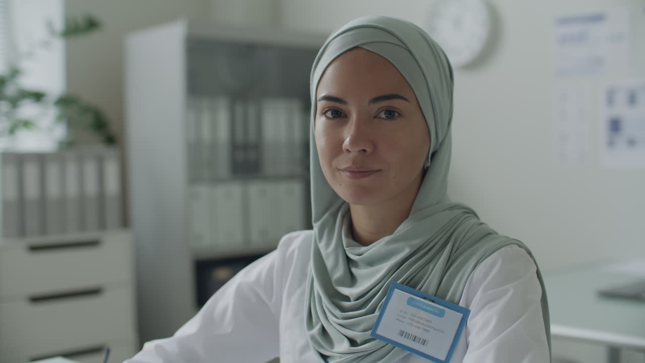 Portrait of Muslim Female Doctor in Hijab in Medical Office