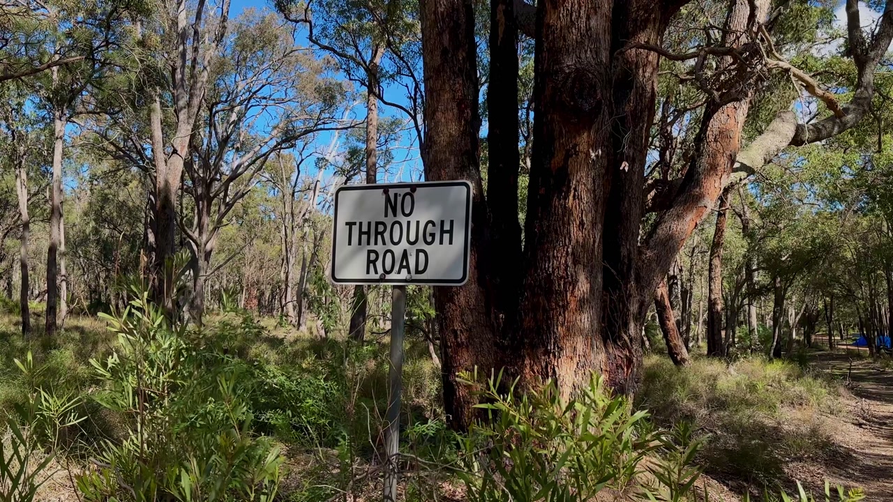 No Through Road sign Bush Trail Western Australia National Park trees dry scrub