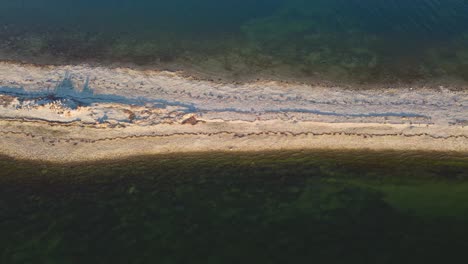 captivating isthmus on beach in hiiumaa island - 4k aerial shot