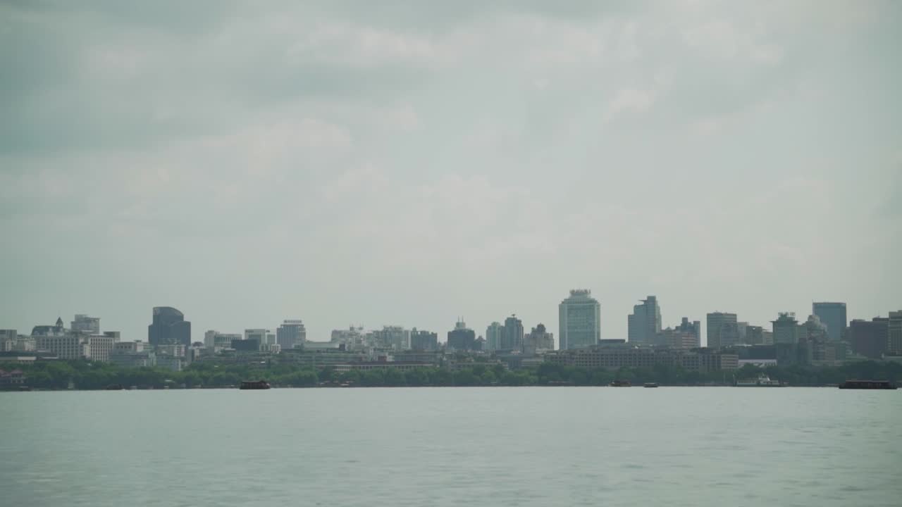 City Skyline Across a Calm Lake