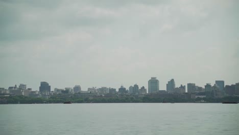 city skyline across a calm lake