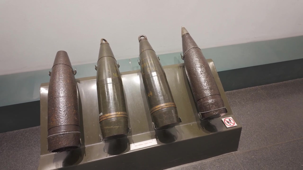4K video shot of exploded ammunition on display at the Cu Chi Tunnels war museum in Vietnam