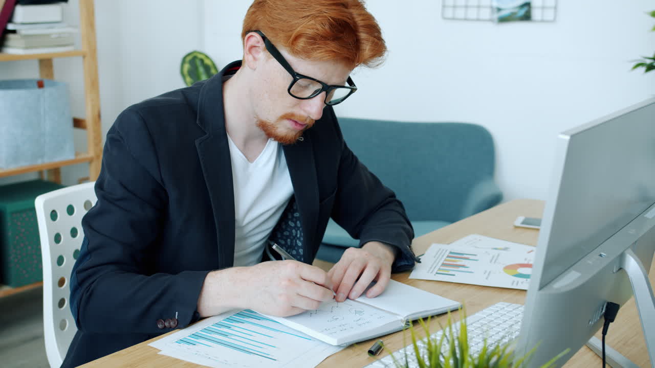 Businessman working on data analysis at his desk