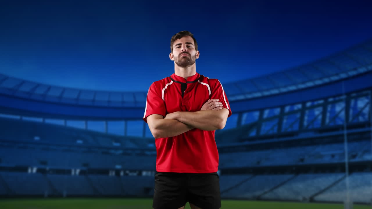 프로 럭비 선수 가 경기장 앞 에 서 있다