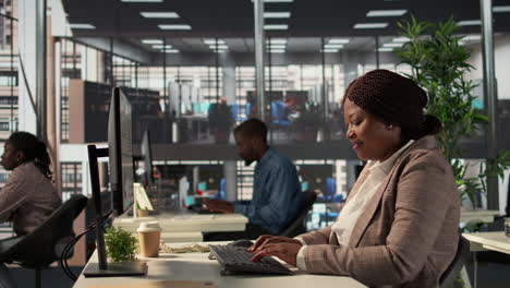 african woman working in modern office