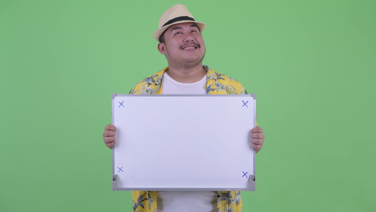 고 잘생긴 젊은 아시아 관광객