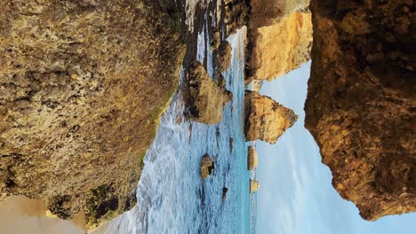 camilo beach at algarve, portugal with turquoise sea in background