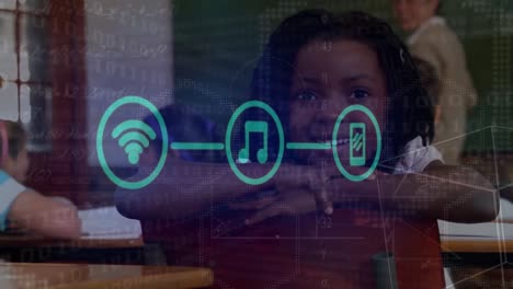 animation of application icons and binary code over smiling african american girl in classroom