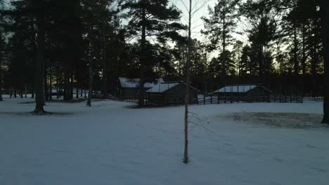 Dolly-Right-Isolated-Wooden-Cabin-in-Wintry-Landscape,-City-Break-Concept