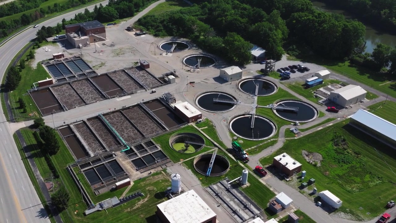 Drone Orbits above Water Treatment Facility with Circular Clarifiers and Aeration Basins