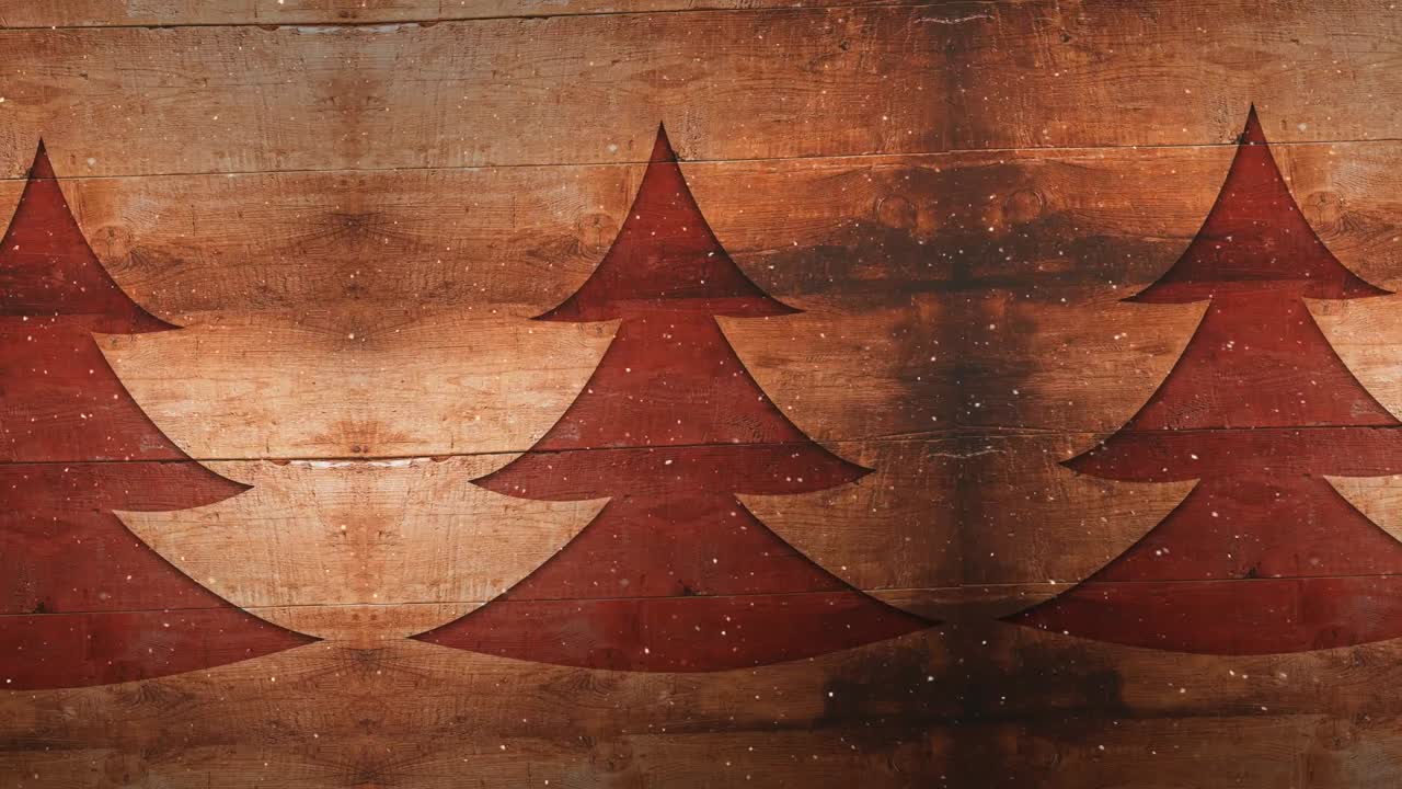 Video composition with snow over pine tree on wood