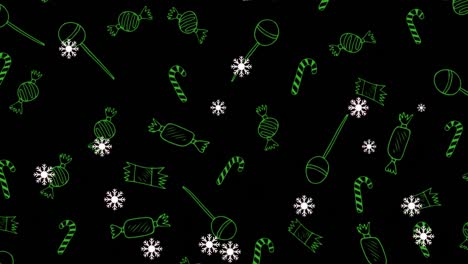 animación de nieve cayendo sobre dulces de navidad sobre fondo negro