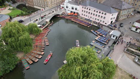 view from air punts moored on river cam cambridge city centre uk