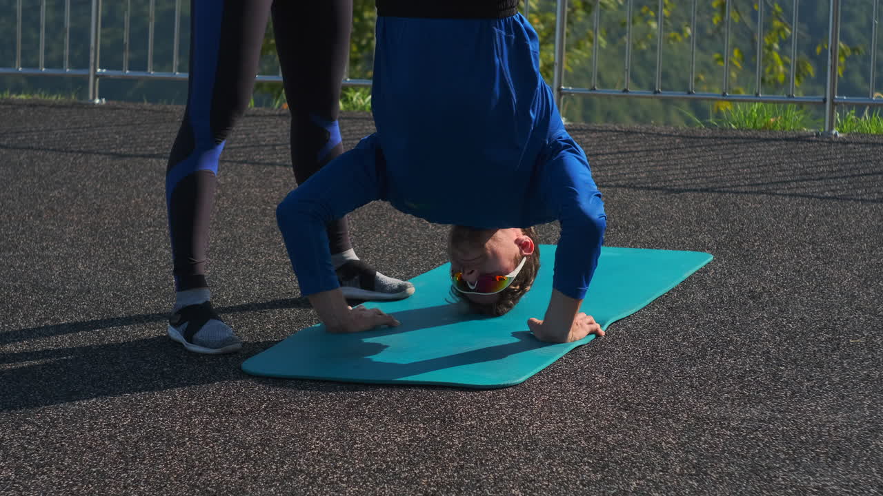 Man and Woman Stretching Outdoors