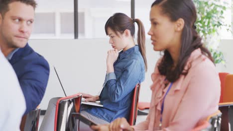 Business-people-working-in-conference-office