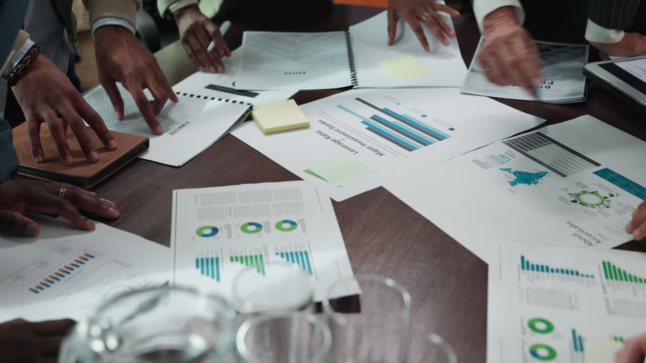 Business meeting with financial analysis and data review