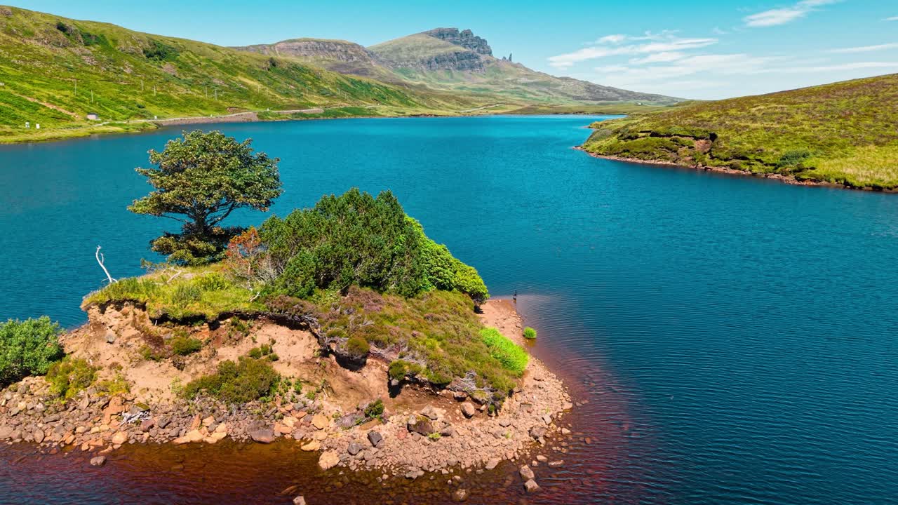 Scenic Lake Landscape with Island and Mountains