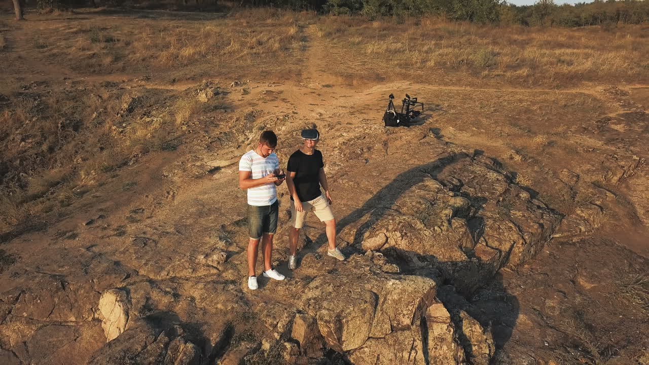 Friends enjoying a beautiful nature hike with VR and Drone gear