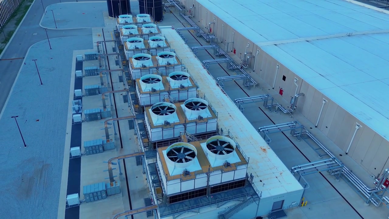 Aerial view of a row of powerful industrial cooling fans at a modern data center in Ohio, USA