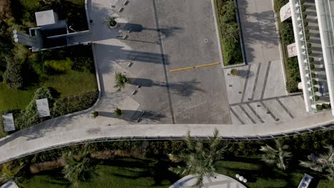 flyover above a swimming pool on a rooftop