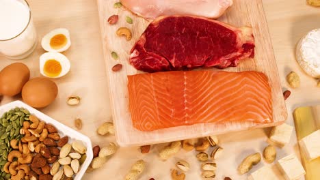 variety of meats, nuts, and eggs on display