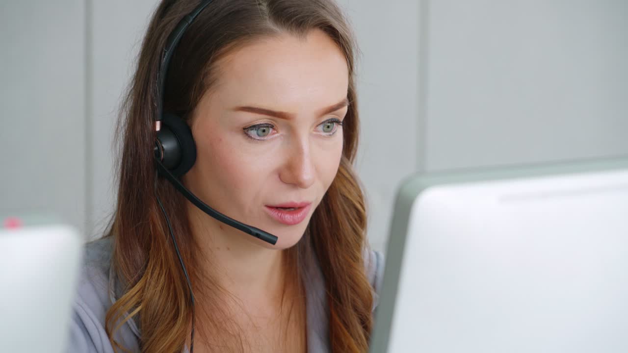 Business people wearing headset working in office