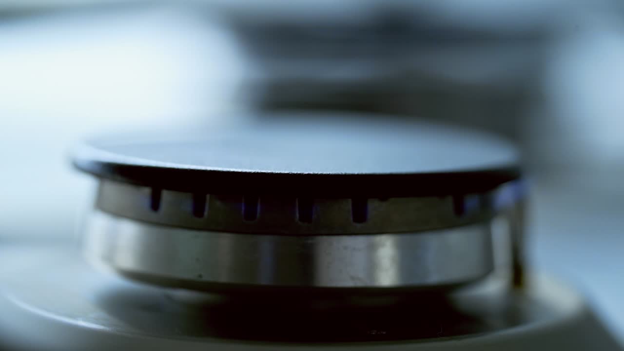 Kitchen burner turning off.